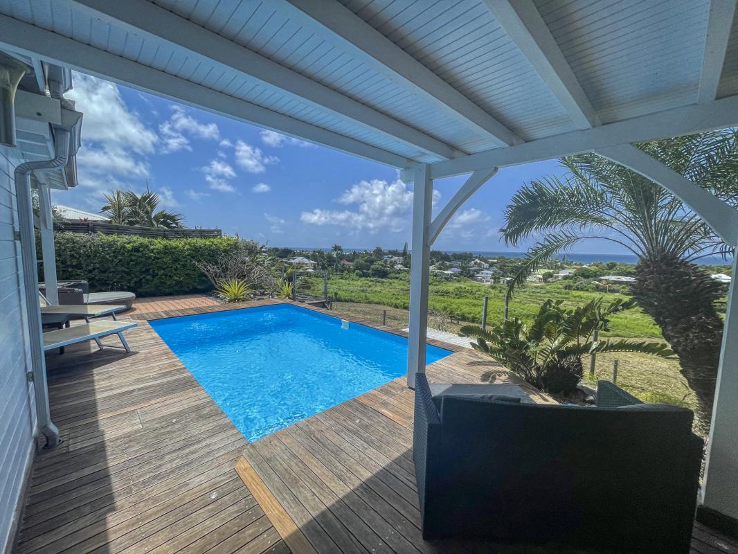Location villa Guadeloupe Saint François - villa 1 chambre 2 adultes et 1 enfant - piscine et vue mer
