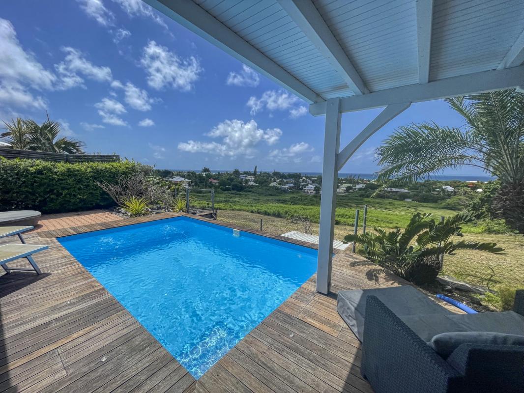 Location villa Guadeloupe Saint François - villa 1 chambre 2 adultes et 1 enfant - piscine et vue mer