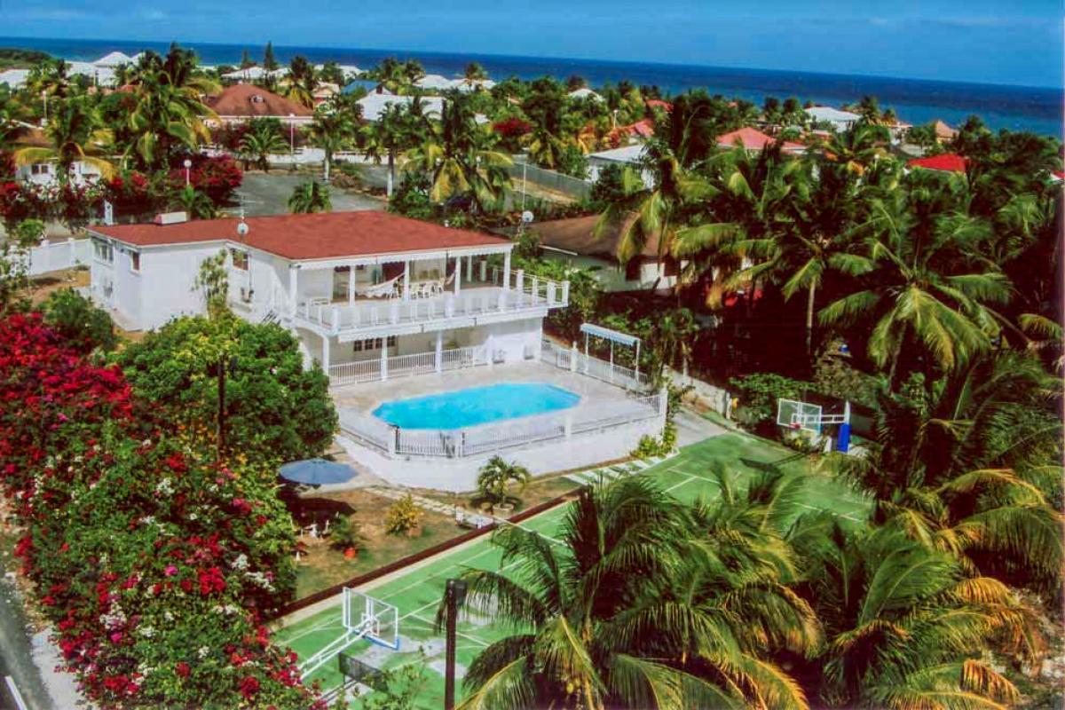 Location villa Guadeloupe St François 7 chambres 14 personnes avec piscine et accés à la mer