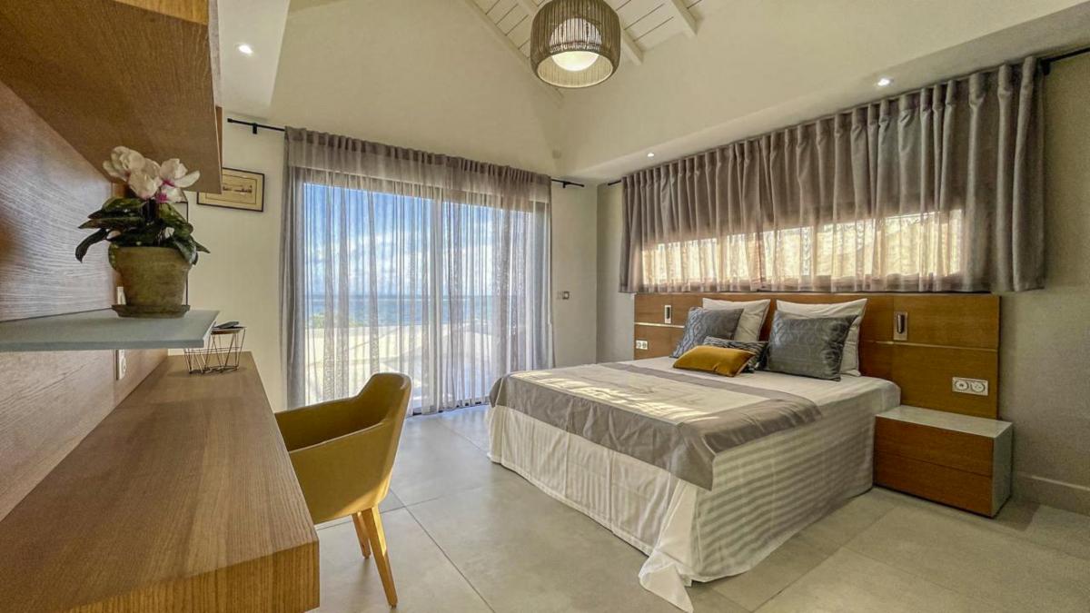 A louer Villa pied dans l'eau Saint François Guadeloupe - Chambre 