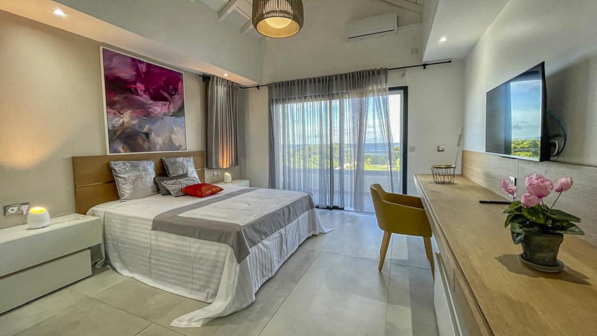 A louer Villa pied dans l'eau Saint François Guadeloupe - Chambre