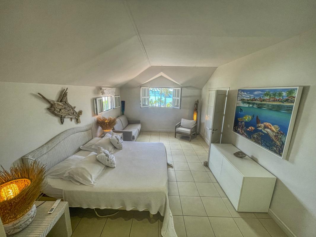Location villa piscine pieds dans l'eau Saint François Guadeloupe_Chambre 4 Etage
