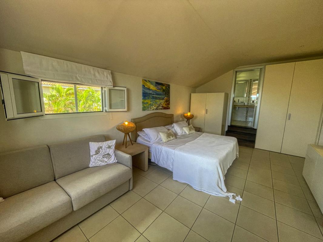 Location villa piscine pieds dans l'eau Saint François Guadeloupe_Chambre 5 Etage