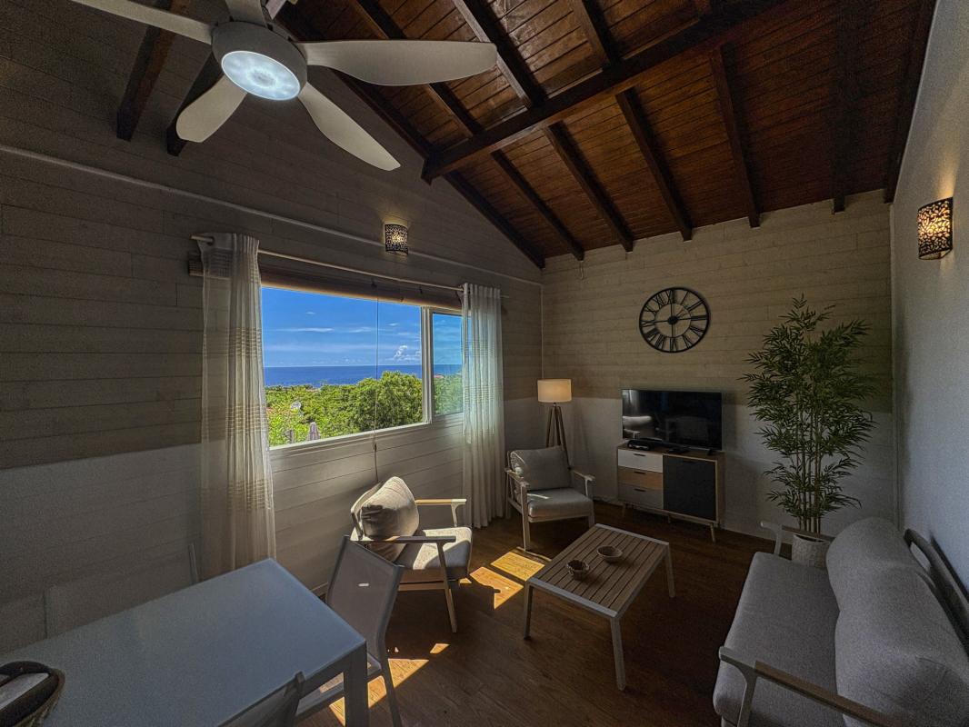 Location villa piscine vue mer Vieux Habitants Guadeloupe_Pièce de vie vue mer