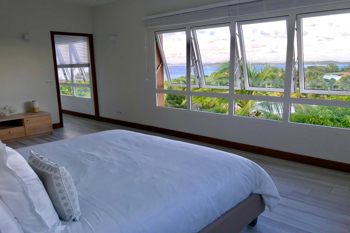 Location villa de luxe piscine vue mer piscine à débordement chambre haut