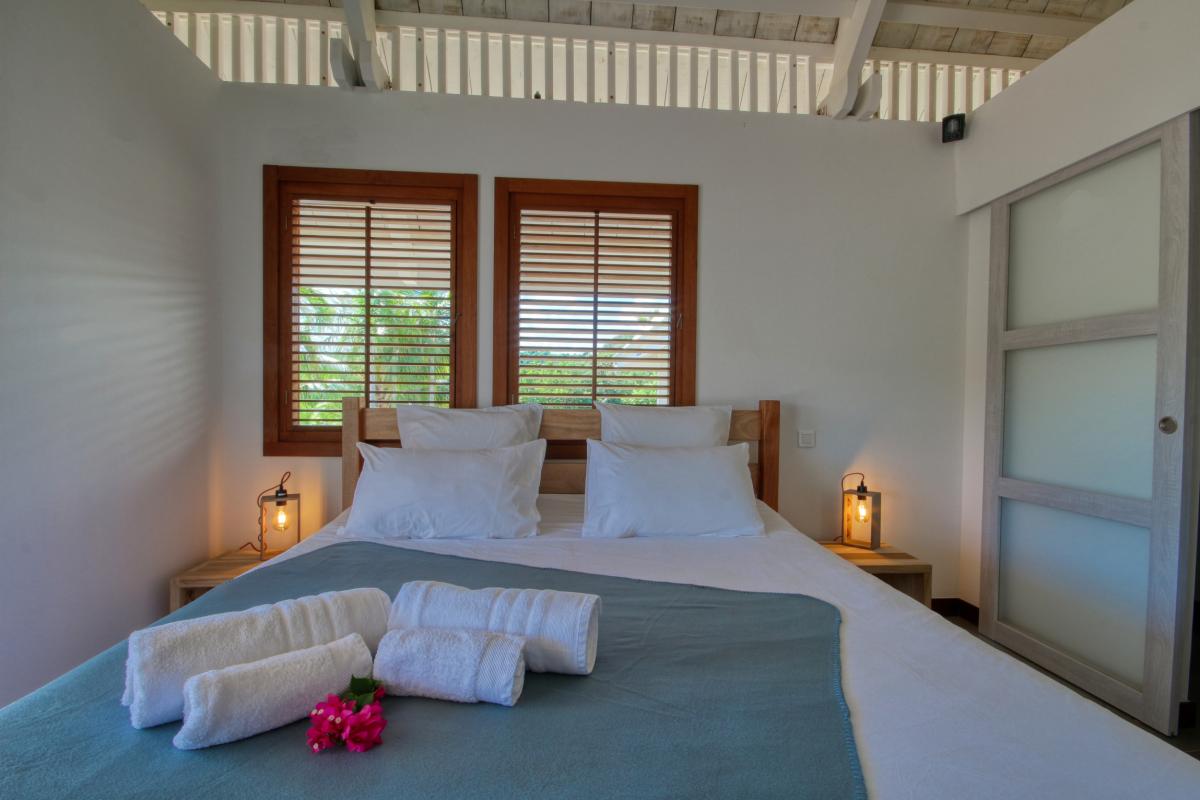 MQRO07 Villa de luxe et d'exception plage privée ponton vue chambre2
