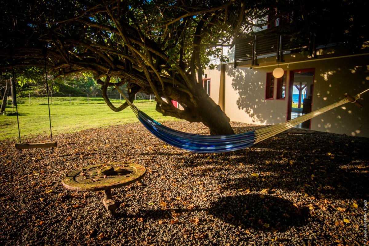 Coin sieste à l'arrière de la villa