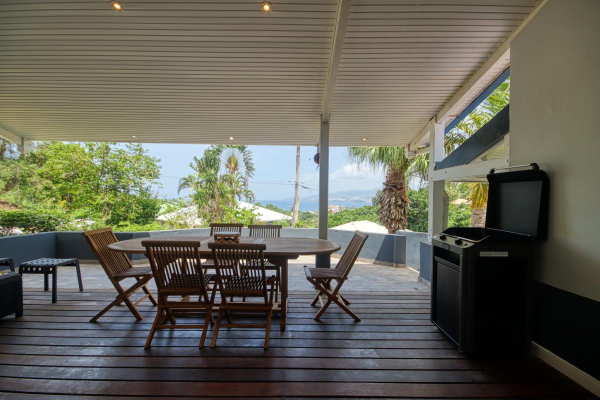 Villa luxe Martinique - Espace repas terrasse ouest