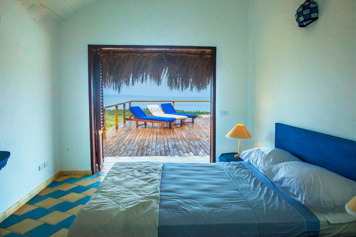 Location villa Las Terrenas - La chambre 1 avec vue sur la terrasse