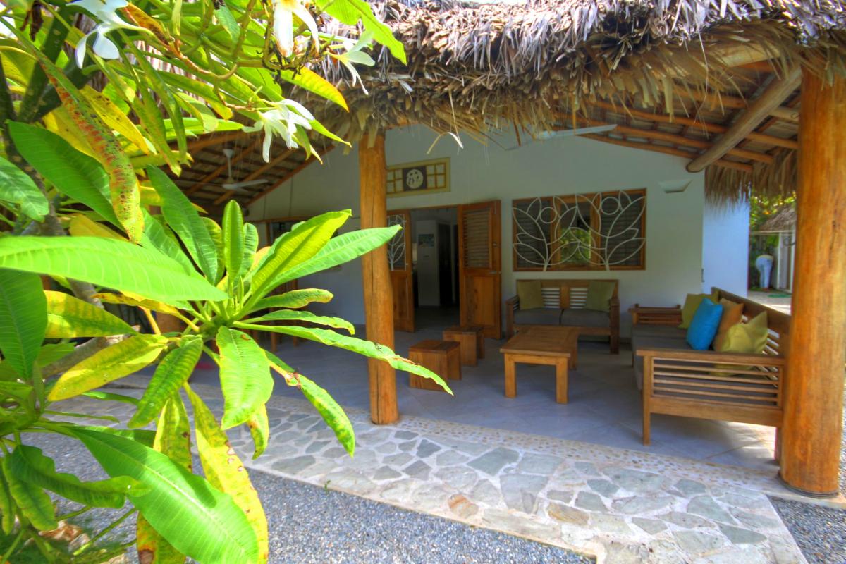 Location villa Las Terrenas - Le coin salon de la terrasse