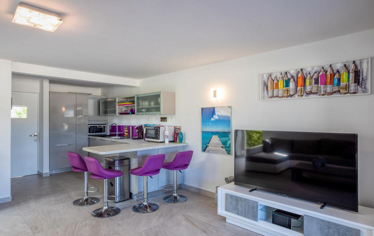 Location villa Saint Martin, Baie Nettlé - Séjour et cuisine